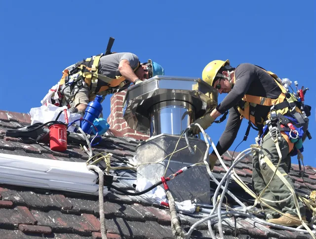 Protective chimney cap installed by Bedford Chimney Sweep in Bedford, OH