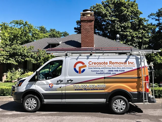 Bedford Chimney Sweep technician removing creosote safely in Bedford, OH